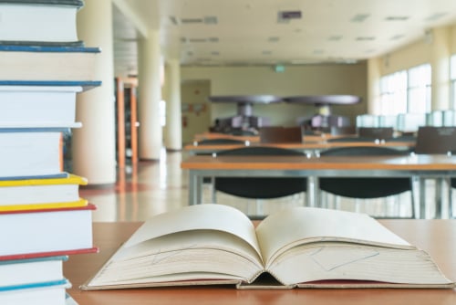 shutterstock_open book in library